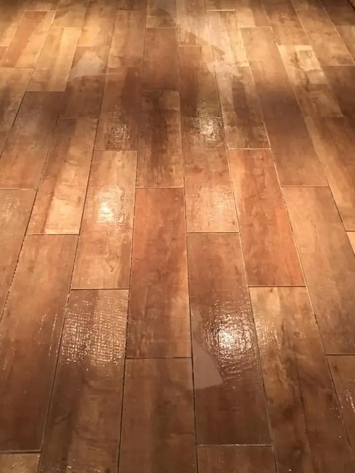 Warm wood-look plank tile flooring, close up